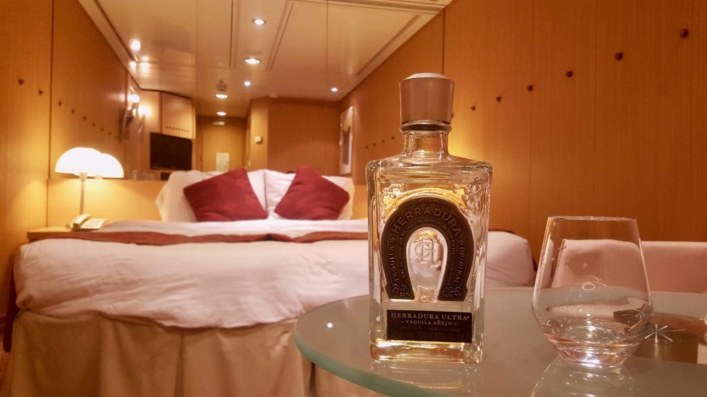 tequila bottle in cruise was set up as bottle service as a way to get cheap drinks on a cruise